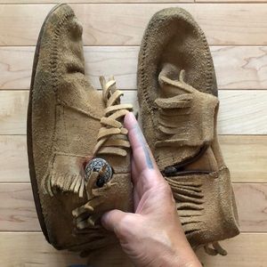 Minnetonka classic fringe bootie with hard sole